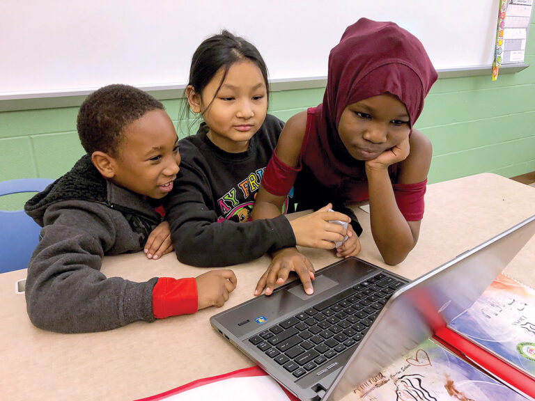 3 kids at computer_4616_SM